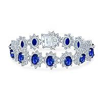Algopix Similar Product 17 - Bling Jewelry Crown Halo Blue Oval CZ